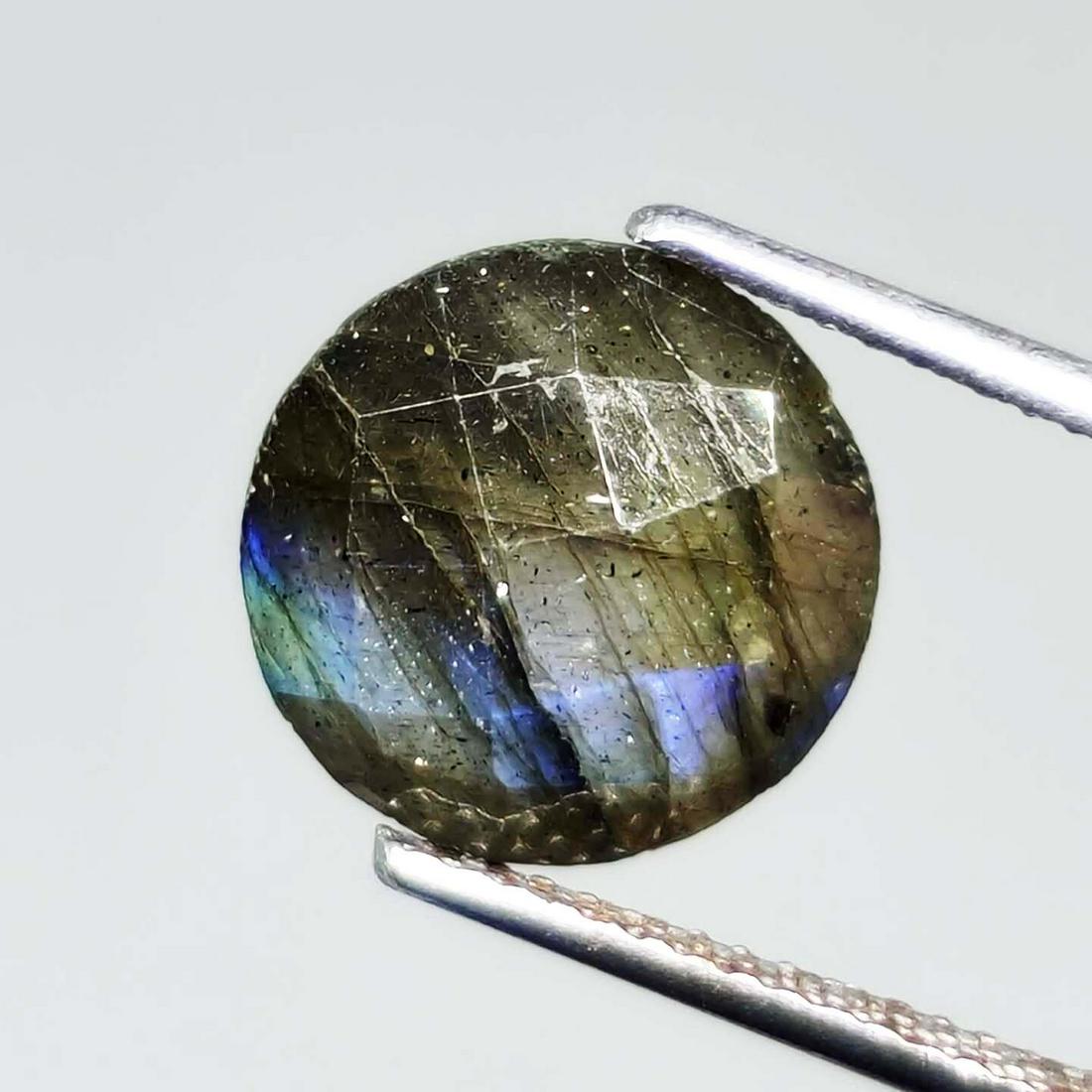 4.05 ct Natural Faceted Labradorite: No Reserve! Title: 4.05 ct Natural Faceted Labradorite Additional Information: Gemstones: Labradorite Carat Weights: 4.05 ct Size/Dimensions: 10 X 10 mm Origin : Labrador Materials & Techniques: Labra