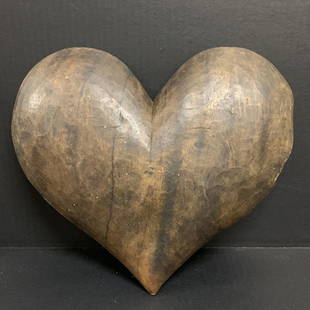 Heart: Title: HeartDate/Period: 20th centuryDimension: 11.5 inches high x 13 inches wideMaterials: WoodAdditional Information: Carved Paper Mache Mold of Heart Reserve: $60.00 Shipping:Domestic: Flat-rate