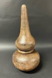 Finial: Title: FinialDate/Period: 20th CenturyDimension: 12 inches high x5.5 inches wideMaterials: WoodAdditional Information: Carved Paper Mache Mold of Finial Reserve: $60.00 Shipping:Domestic: Flat-rate