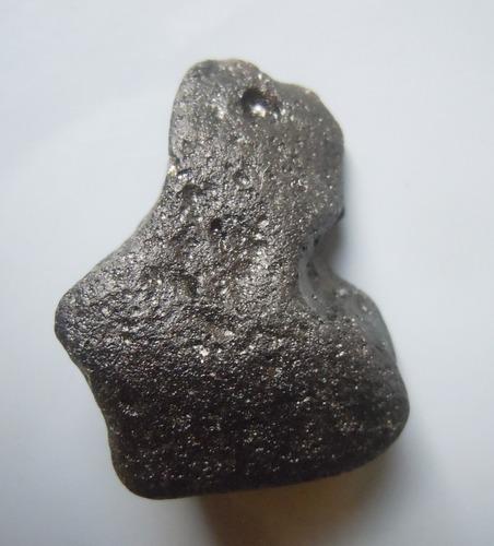 PHILIPPINITE TEKTITE - FROM METEORITE IMPACT: Title: PHILIPPINITE TEKTITE - FROM METEORITE IMPACT Origin: Paracale, Camarines Norte, Luzon, Philippines Size: 2x2x1.5 cm / 3 gram Description: complex shaped philippinite tektite with good pits. per