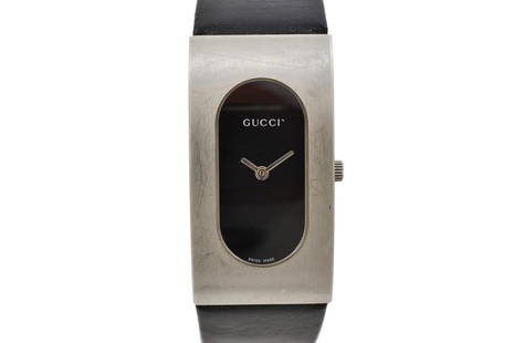 Vintage Gucci 2400L Quartz Stainless Steel Ladies Watch: Title: Vintage Gucci 2400L Quartz Stainless Steel Ladies Watch Brand: Gucci Date: 1990s Model: 2400L Movement: Quartz Functions: Time Case Metal: Stainless steel Case Size: 22mm X 40mm Diamonds/Gemsto