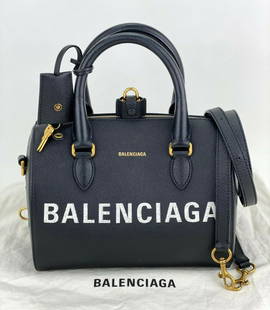 Balenciaga Bag Ville Bowling Small Black Grained Leather Satchel Crossbody B434: SKU B434 1021 Pre-Owned 100% Authentic Balenciaga Small Ville Bowling Bag Grained Calfskin RATING: B+...Very Good, well maintained, shows minor signs of wear MATERIAL: grained calfskin leather