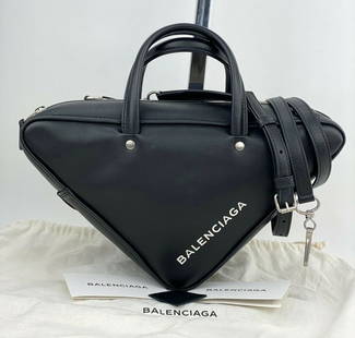 BALENCIAGA Women Handbag Triangle Duffle S Black Calfskin 476975 Crossbody B283: SKU B283 0221 Balenciaga Triangle Duffle 100% Authentic Pre-Owned RATING: A..excellent, near mint, shows only slight signs of use MATERIAL: leather HANDLE: stiff in excellent condition COLOR: black