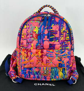 CHANEL Bag CC Foulard Fabric Quilted Printed Backpack Pink Travel B293 Authentic: SKU B293 0321 CHANEL Foulard Fabric Quilted Printed Backpack Pink This stylish backpack is beautifully crafted of diamond quilted nylon in a multi color pattern. The backpack features a fabric top