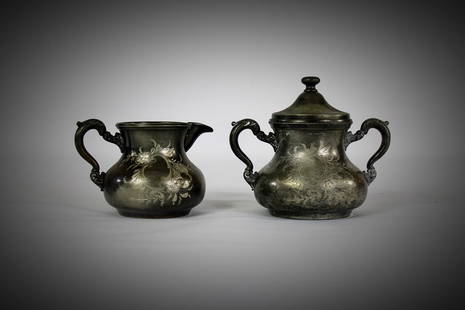Silver Etched Cream & Sugar Set: Title: Silver Etched Cream & Sugar SetDescription: St. Louis Silver Company Quadruple Silver Plate Etched Cream & Sugar Set. St. Louis Silver Co. was located on 207 then 118, Chestnut Street, St