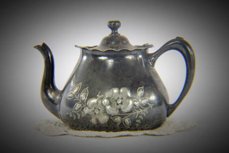Silver Etched Teapot: Title: Silver Etched TeapotDescription: Teapot Quadruple Plated Silver Heavy Vaccard & Co. St. Louis Ornate FloralDate/Period: Materials: Silver Plated MetalDimension: 6"H x 9"W & 3" Opening 