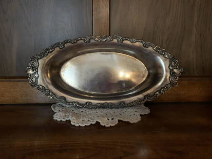Silver Platter with Floral Accent: Title: Silver Platter with Floral AccentDescription: St. Louis Silver Company Quadruple 204 Silver Platter. St. Louis Silver Co. was located on 207 then 118, Chestnut Street, St Louis City. Missouri.