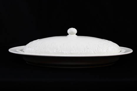 Covered White Ceramic Serving Platter: Title: Covered White Ceramic Serving PlatterDescription: Covered White Ceramic Serving Platter. Made by CWC in Italy.Date/Period: Late 20th CenturyMaterials: CeramicDimension: Platter - 23"L x 13"W x