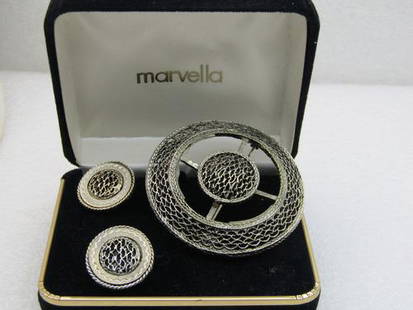 Vintage Marvella Brooch & Clip Earrings Set, in original box: Vintage Marvella Brooch & Clip Earrings Set, in original box Reserve: $40.00 Shipping:Domestic: Flat-rate of $5.00 to anywhere within the contiguous U.S.International: Foreign shipping rates are