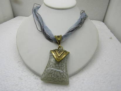 Gray Pendant on 16" Gray Multi-Strand Ribbon Necklace with Rhinestones: Gray Pendant on 16" Gray Multi-Strand Ribbon Necklace with Rhinestones Reserve: $20.00 Shipping:Domestic: Flat-rate of $5.00 to anywhere within the contiguous U.S.International: Foreign shipping