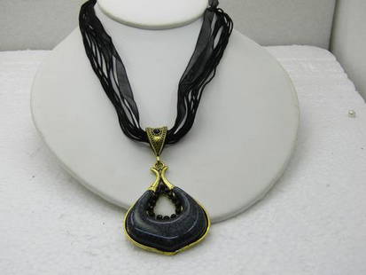 Black Pendant on 16" Black Multi-Strand Ribbon Necklace with Rhinestones.: Black Pendant on 16" Black Multi-Strand Ribbon Necklace with Rhinestones. Reserve: $20.00 Shipping:Domestic: Flat-rate of $5.00 to anywhere within the contiguous U.S.International: Foreign shipping