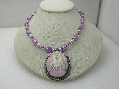 Vintage Pink Cameo Necklace 18" Lavender Beaded Necklace: Vintage Pink Cameo Necklace 18" Lavender Beaded Necklace Reserve: $30.00 Shipping:Domestic: Flat-rate of $5.00 to anywhere within the contiguous U.S.International: Foreign shipping rates are