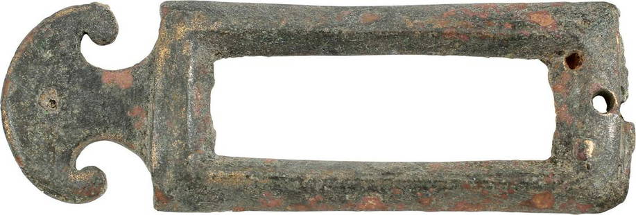 ROMAN MILITARY BELT PLATE, 250-300 AD: Mid-late 2nd century AD. See https://www.forumancientcoins.com/numiswiki/view.asp?key=Military%20Belts image 17 lower left. Bronze, 2 3/4" length with volute ends and a central rectangular opening.