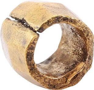 ANCIENT VIKING GILT BEAD, 9TH-11TH CENTURY AD: 7.0mm in length, over 1/4 inch. Hand formed from bronze, forged to hexagonal section with the center swelled to a ridge. Butted seam. Professionally refurbished with the 24karat gold overlay