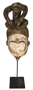 Mask – Wood – Punu – Gabon: Title: Mask – Wood – Punu – GabonDescription: Stylistic wooden initiation mask from the PUNU tribe, Gabon. PUNU masks are thought to represent ancestors` faces. They are worn during