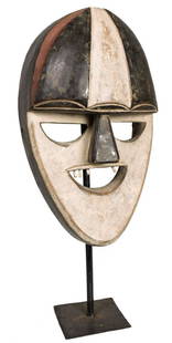 War Mask – Wood – Boa – DR Congo: Title: War Mask – Wood – Boa – DR CongoDescription: Classical Boa-mask with oval eyes, large mouth with wooden teeth. This type of mask is used war-mask worn by a witch doctor in