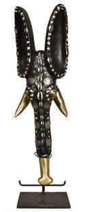 Elephant Mask – Cauris, Wood, Coins – Bamileke – Cameroon: Title: Elephant Mask – Cauris, Wood, Coins – Bamileke – CameroonDescription: Elephant masks, worn on the top of the head, were an important part of every ritual dance sequence. The