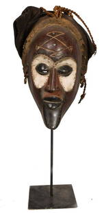 Mask – Plant fibre, Wood – Mwana Pwo – Chokwe – Congo: Title: Mask – Plant fibre, Wood – Mwana Pwo – Chokwe – CongoDescription: A fine female Mwana Pwo mask from the Tschokwe tribe of DR Congo The Chokwe are well known for art