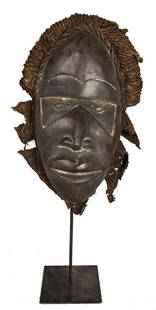 Mask – Wood, Textile – Dan – Ivory Coast: Title: Mask – Wood, Textile – Dan – Ivory CoastDescription: Beautifully tribal used Deangle mask of the DAN people of Liberia. The imposing wooden mask is covered with around the