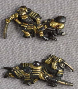 Pair 19c Japanese sword MENUKI 4 SAMURAI fighting: Pair of early 19th century Japanese sword menuki each depicting a pair of armored samurai in sword fights in different attitudes. Wonderful work, bronze with gilding, slight wear, in very good