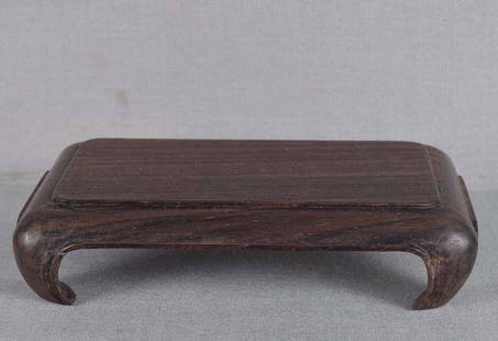 Vintage Chinese wooden stand: Vintage Chinese wooden stand of simple rectangular shape with scroll shaped legs. Beautiful dark dense rosewood with wonderful patina, in excellent condition. Maximum length 104 mm, maximum width 66