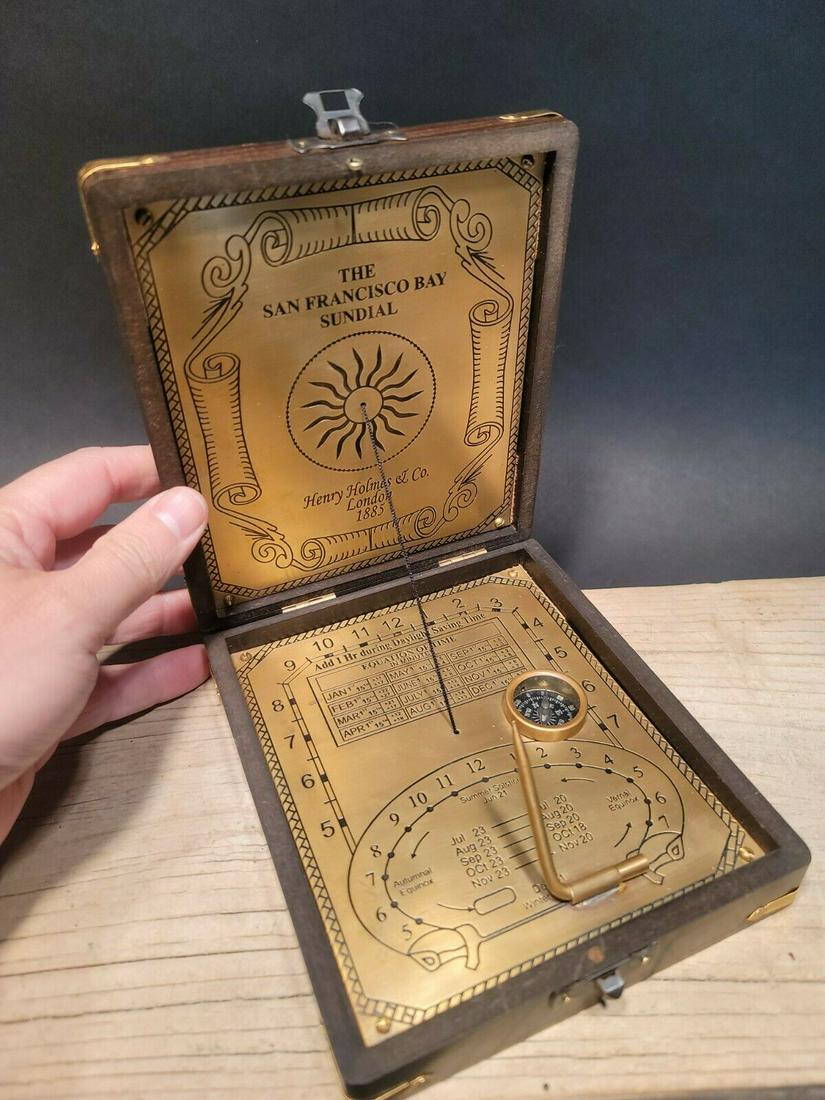 Wood Sundial Henry Holmes Compass Instrument: 5 1/2" x 6 1/2 x 1 1/2" Such a neat reproduction antique compass. All harwood and engraved brass. Such a neat functional instrument! All our items come with a 100% customer satisfaction guarantee. Res