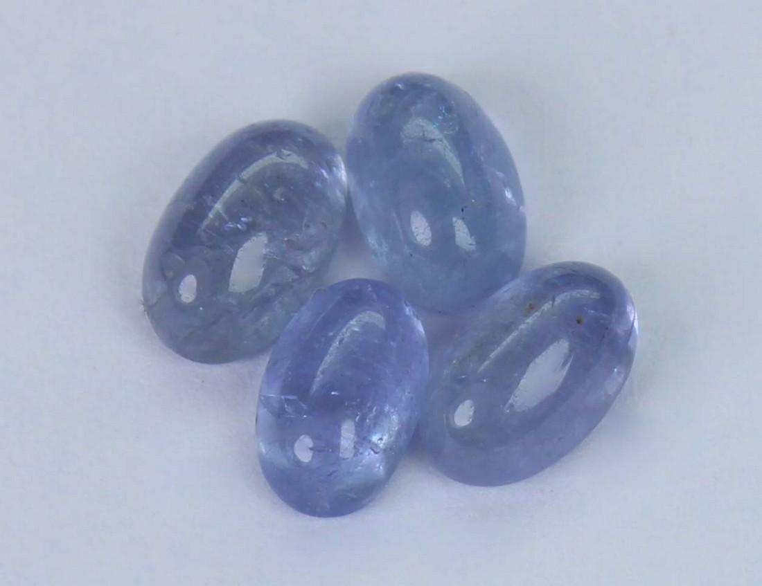 2.11 cts Natural Tanzanite Lot: No Reserve! Title: 2.11 cts Natural Tanzanite Lot Additional Info: Gemstone : Natural Tanzanite. Shape and cut : Oval cabochan. Weight : 2.11 carats. Measurements : 6.00x3.85x2.56 mm - 5.52x3.52x2.14 