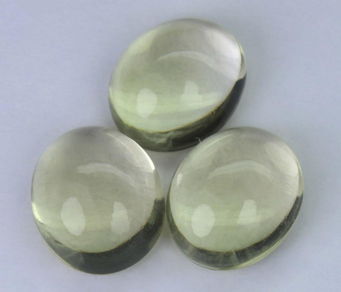 12.96 Cst Natural Lemon Lot: No Reserve! Title: 12.96 Cst Natural Lemon Lot Additional Info: Gemstone : Natural Lemon . Shape and cut : Oval Cabochan. Weight : 12.96 carats. Measurements : 11.81x9.90x5.72mm -11.72x9.76x5.81mm -11