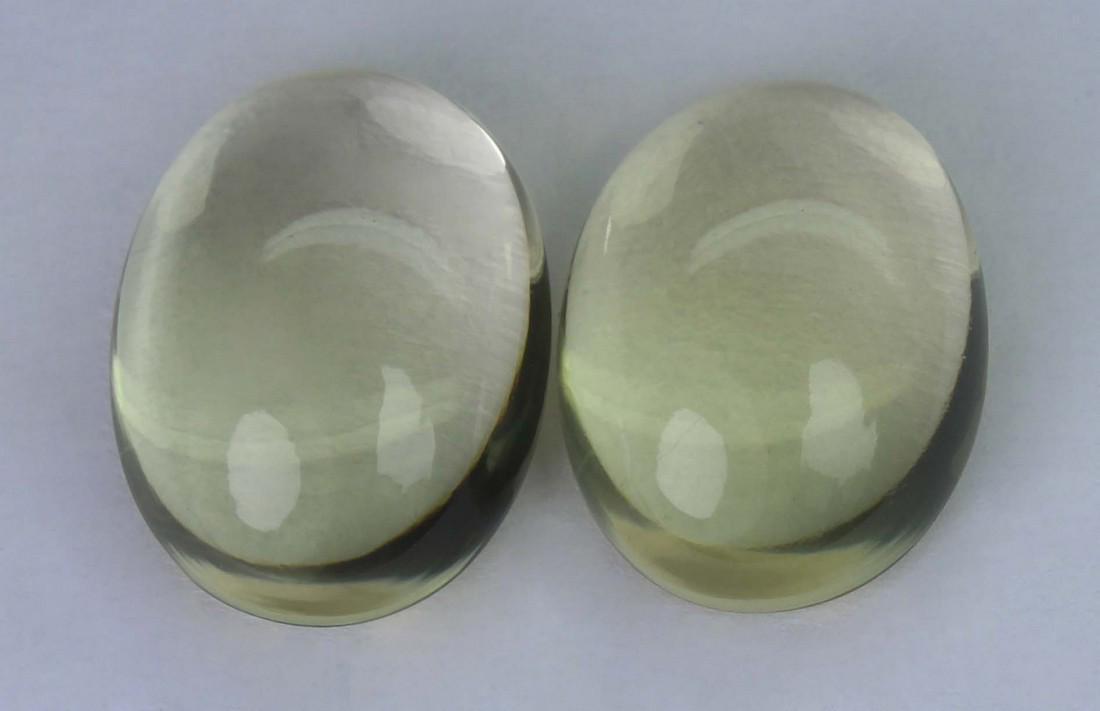 11.06 Cst Natural Lemon Lot: No Reserve! Title: 11.06 Cst Natural Lemon Lot Additional Info: Gemstone : Natural Lemon . Shape and cut : Oval cabochan. Weight : 11.06 carats. Measurements : 14.34x10.50x5.90mm - 13.77x10.30x5.42 mm