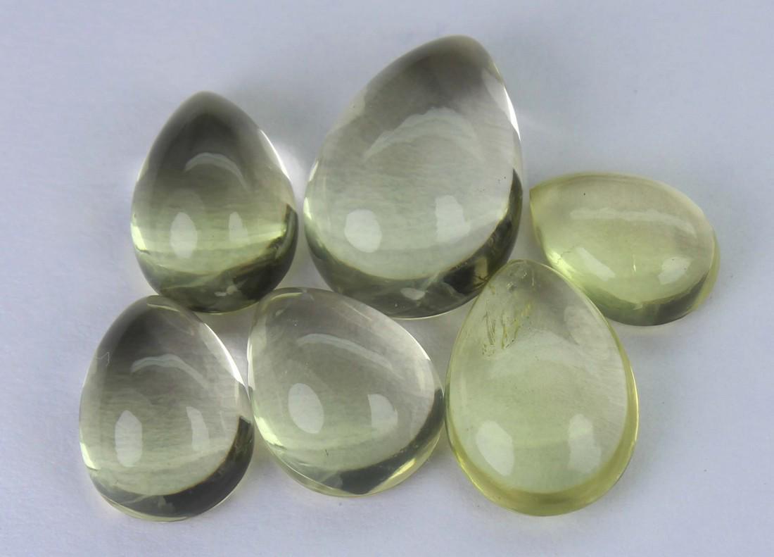 15.35 Cst Natural Lemon Lot: No Reserve! Title: 15.35 Cst Natural Lemon Lot Additional Info: Gemstone : Natural Lemon . Shape and cut : Pear cabochan. Weight : 15.35 carats. Measurements : 12.90x8.97x5.74mm - 8.76x6.06x3.38. Colo