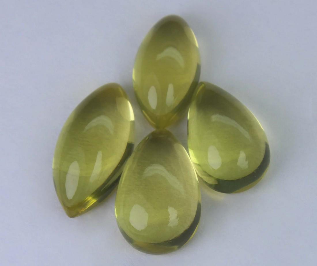 9.51 Cst Natural Lemon Lot: No Reserve! Title: 9.51 Cst Natural Lemon Lot Additional Info: Gemstone : Natural Lemon . Shape and cut : Pear and marquise cabochan. Weight : 9.51 carats. Measurements : 13.22x6.69x4.38mm -11.23x6.54
