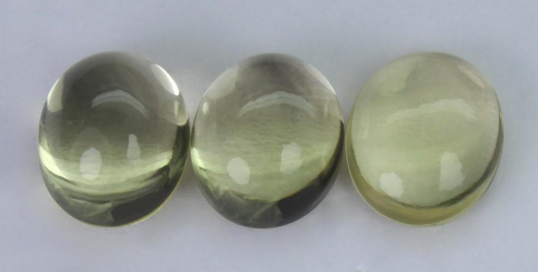 10.66 Cst Natural Lemon Lot: No Reserve! Title: 10.66 Cst Natural Lemon Lot Additional Info: Gemstone : Natural Lemon . Shape and cut : Oval Cabochan. Weight : 10.66 carats. Measurements : 11.08x9.04x4.26 mm, 10.80x8.72x6.27 mm, 