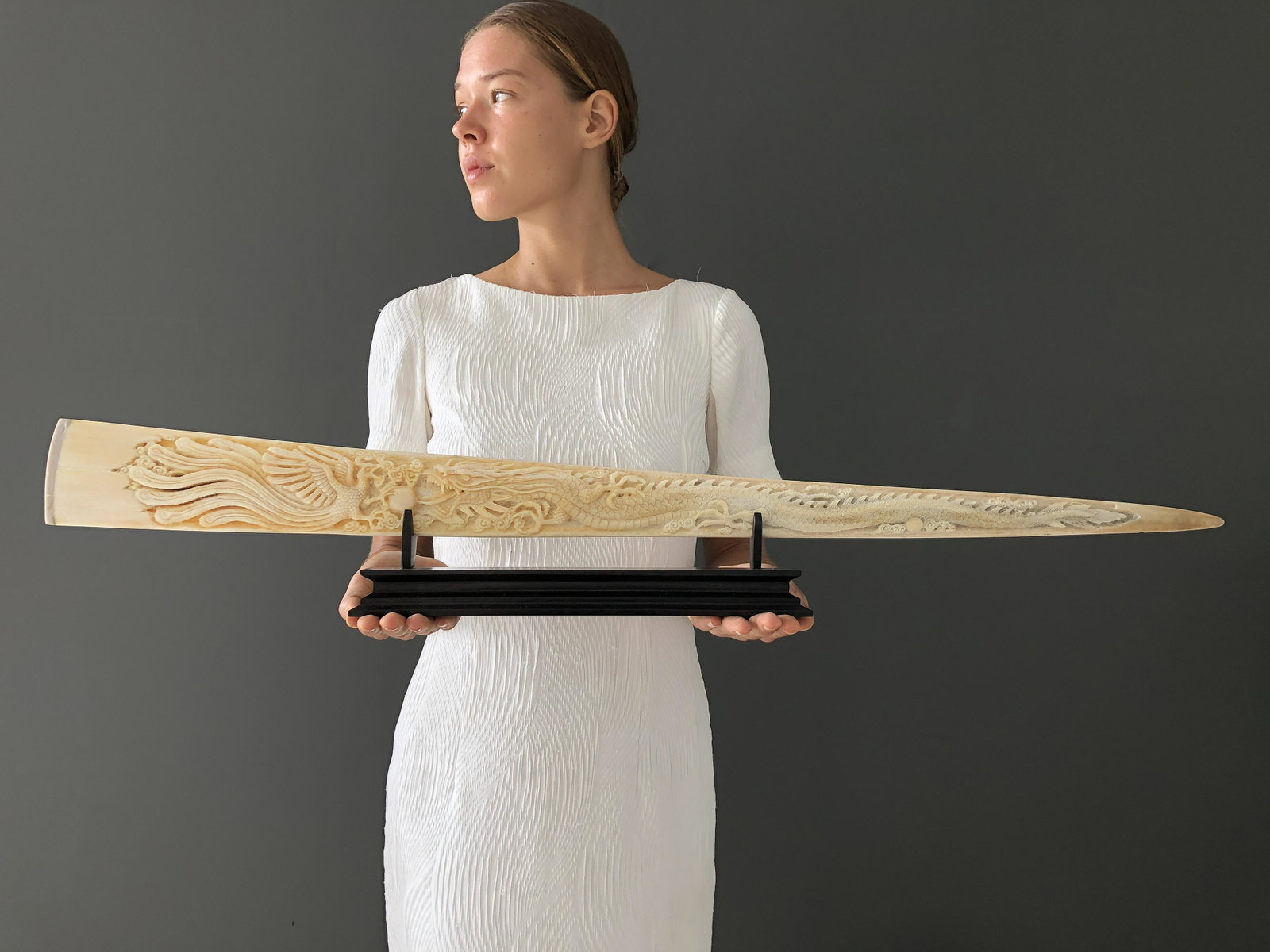 Large engraved Swordfish rostrum - Dragon Phoenix: Title: Large engraved Swordfish rostrum - Dragon Phoenix Maker: Unknown Origin: Indonesia Date/Period: 2016 Materials: Bone, Xiphius Gladius, Wood Dimensions:Length of tusk: 92 cm / 36.2 inches Descri