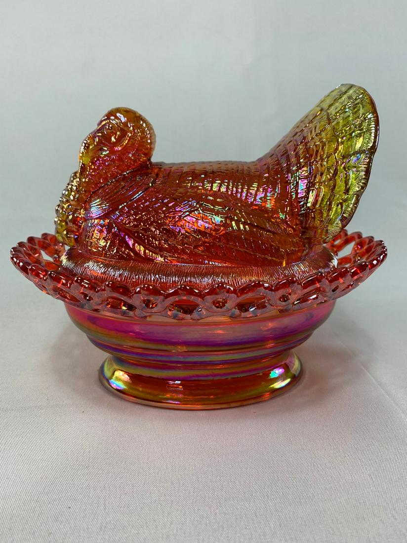 Carnival Glass Turkey in Nest: Title: Carnival Glass Turkey in Nest Date/Period: Late 20th centry Materials: Glass Size: 8.25"W x 7"H x 3"D Additional Information: Vintage Mosser Glass Pink/Orange/Yellow iridescent Carnival Turkey 