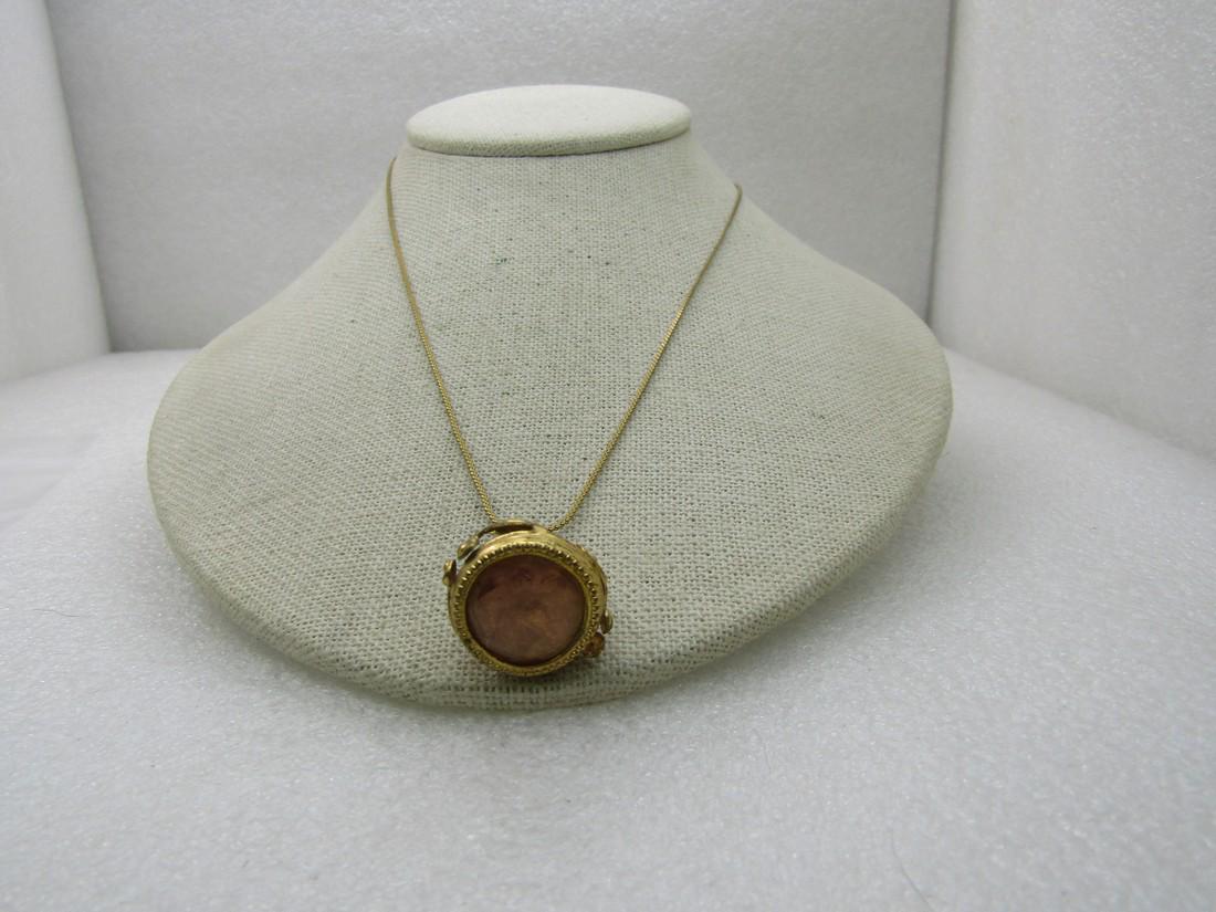 Vintage Victorian Watch Fob Pendant Necklace, 18": Vintage Victorian Watch Fob Pendant Necklace, 18". This is a mix of old and newer. Gold tone pressed metal and pink faceted glass watch fob that is turned into a pendant and place on an 18" 1950's-196