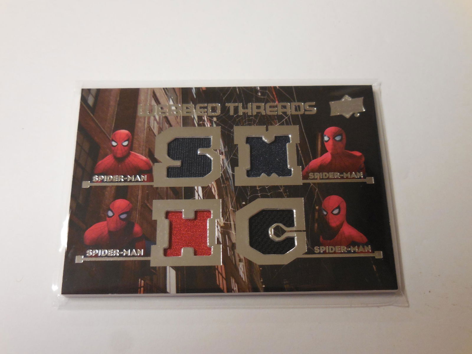 17 UD MARVEL SPIDER MAN QUAD RELIC (1 of 2)