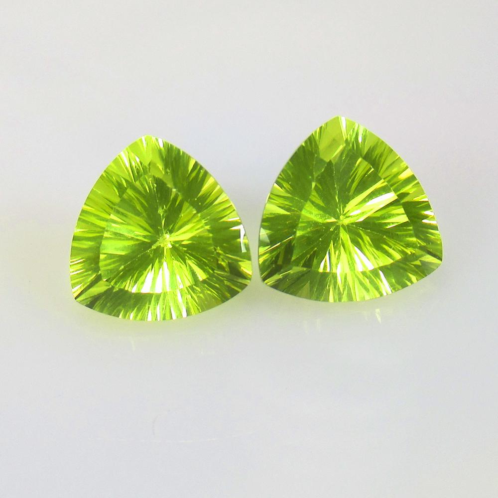 10.61 Ctw Natural Lemon Quartz Trillion Pair: Title: 10.61 Ctw Natural Lemon Quartz Trillion Pair Stone Clarity: VVS Gemstones: Natural Lemon Quartz Carat Weights: 10.61 Size/Dimensions: 11.90 x 11.80 x 8.10 mm / 2 P'cs Additional Information: Go