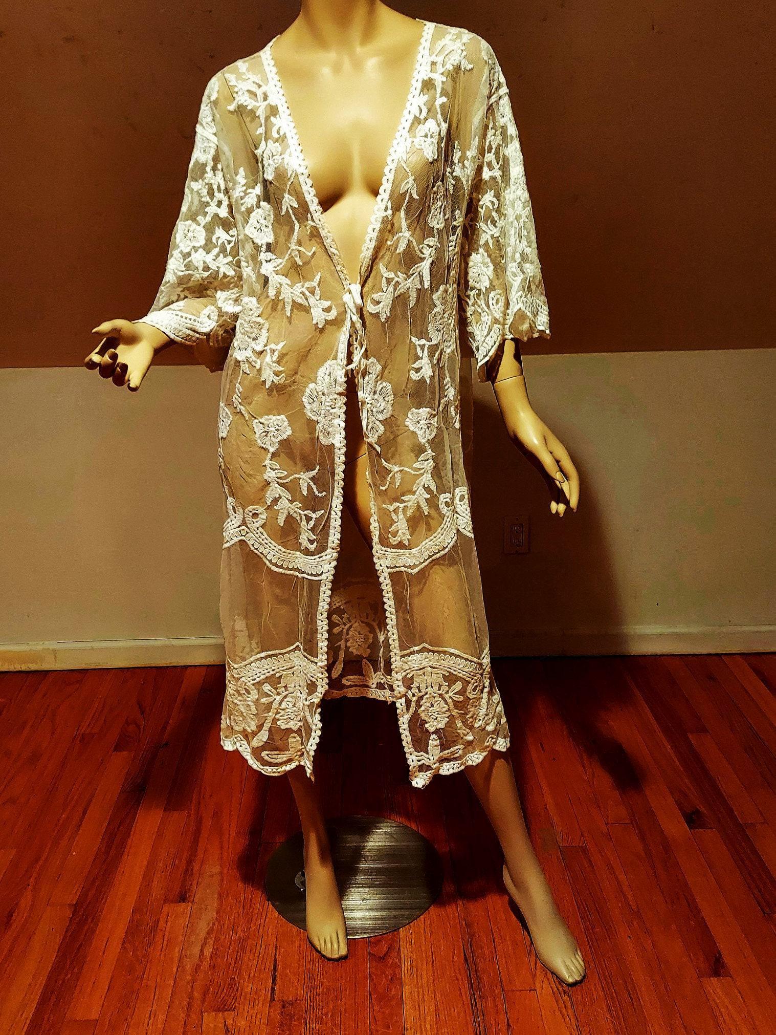 Vtg Embroidered Lace Floral Layering Kimono/Dress Rare: Vtg Amazingly Beautiful Layering all Floral Embroidered on Tulle Lace Kimono Over dress Tie Front and Amazing in Eggshell White One Open Size. To Die For Reserve: $75.00 Shipping: Domestic: Flat-rate 