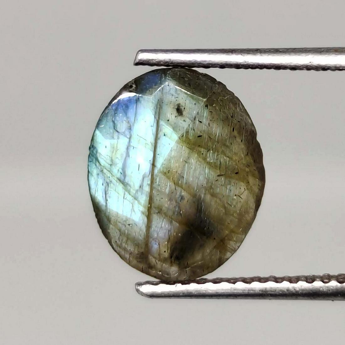 2.10 ct Natural Faceted Labradorite: No Reserve! Title: 2.10 ct Natural Faceted Labradorite Additional Information: Gemstones: Labradorite Carat Weights: 2.10 ct Size/Dimensions: 9 X 11 mm Origin : Labrador Materials & Techniques: Labrad