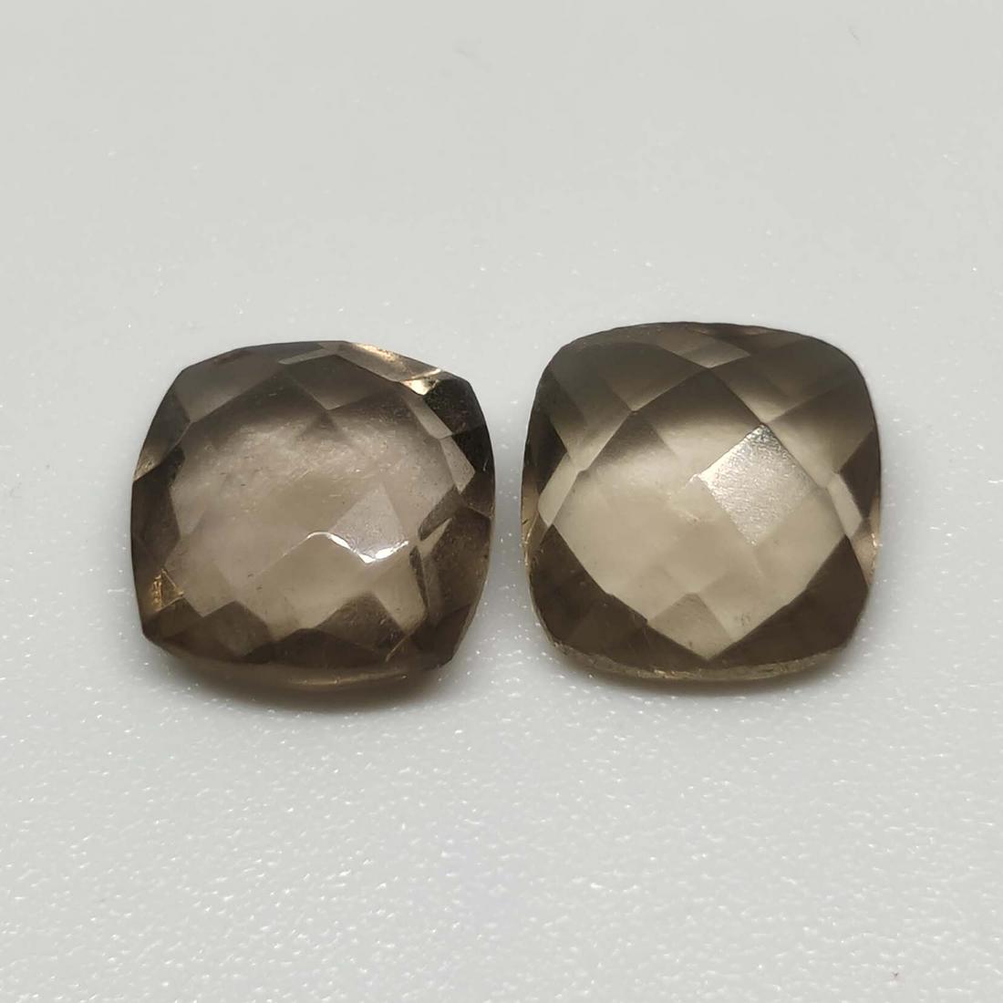 2.90 ct Natural Smoky Quartz Pair: No Reserve! Title: 2.90 ct Natural Smoky Quartz Pair Additional Information: Gemstones: Smoky Quartz Carat Weights: 2.90 ct Size/Dimensions: 7 X 7 mm Origin : Scotland Materials & Techniques: Quartz W
