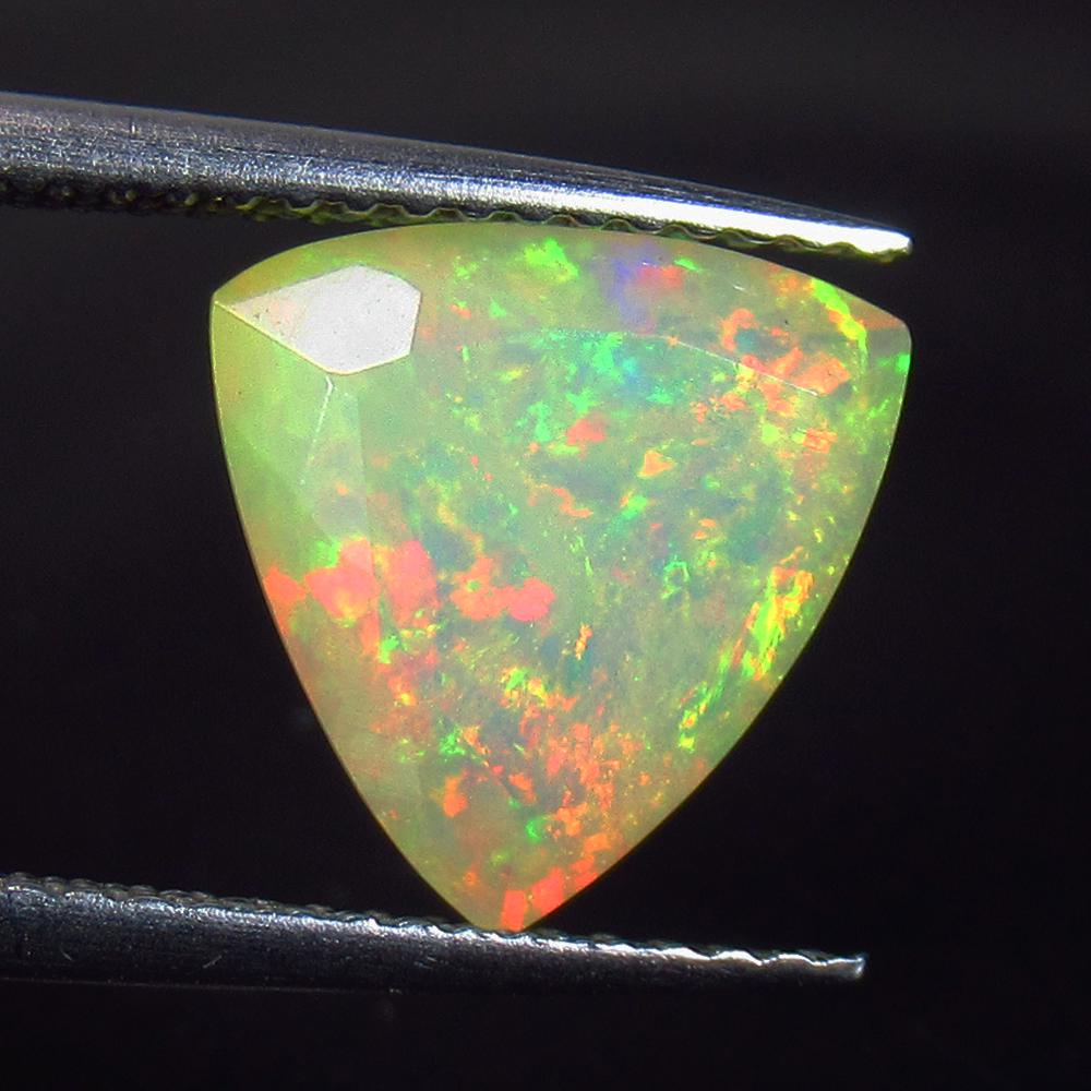 2.31 Ct Natural Ethiopian Multicolor Opal Trillion Cut (1 of 2)