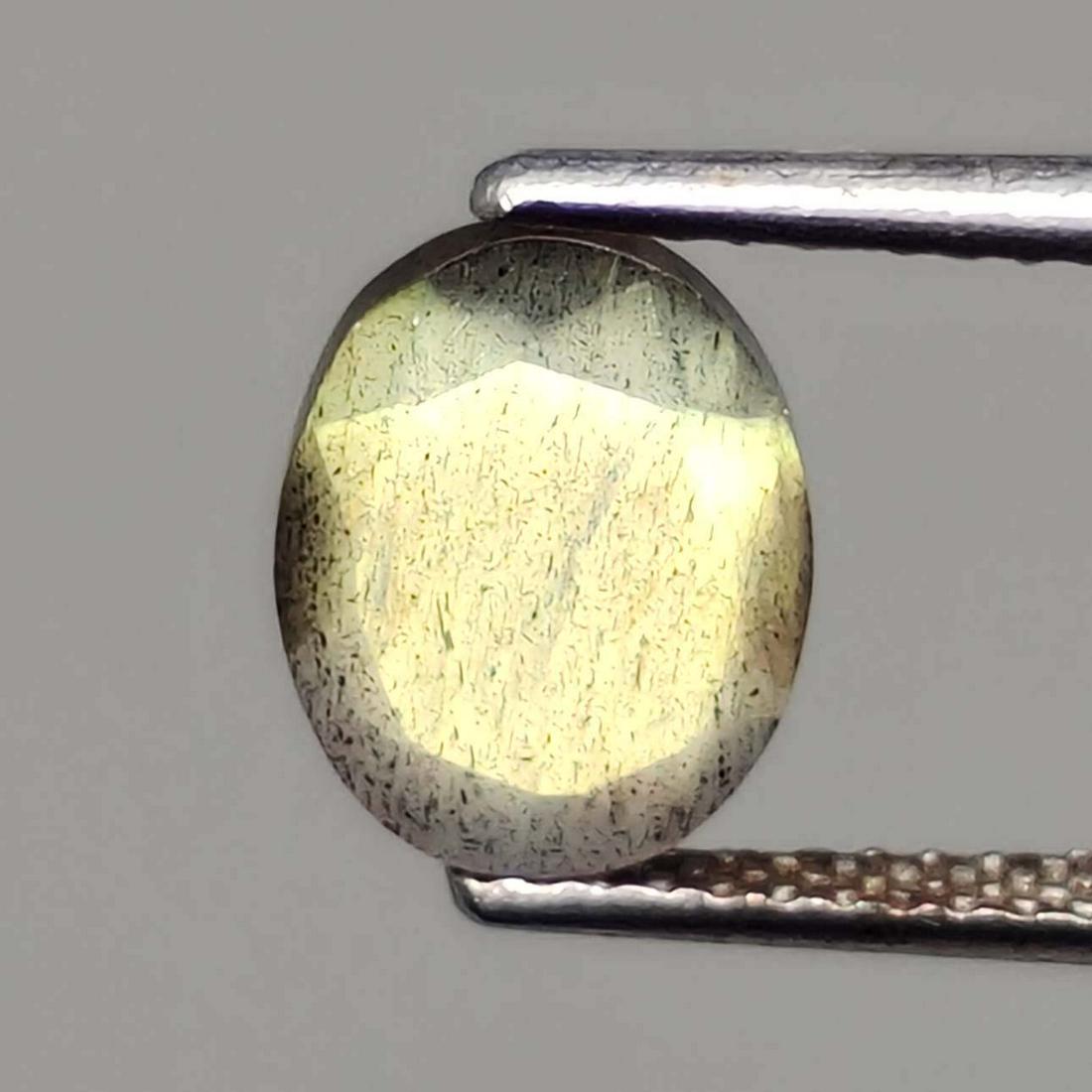 1.65 ct Natural Faceted Labradorite: No Reserve! Title: 1.65 ct Natural Faceted Labradorite Additional Information: Gemstones: Labradorite Carat Weights: 1.65 ct Size/Dimensions: 7 X 9 mm Origin : Labrador Materials & Techniques: Labrado