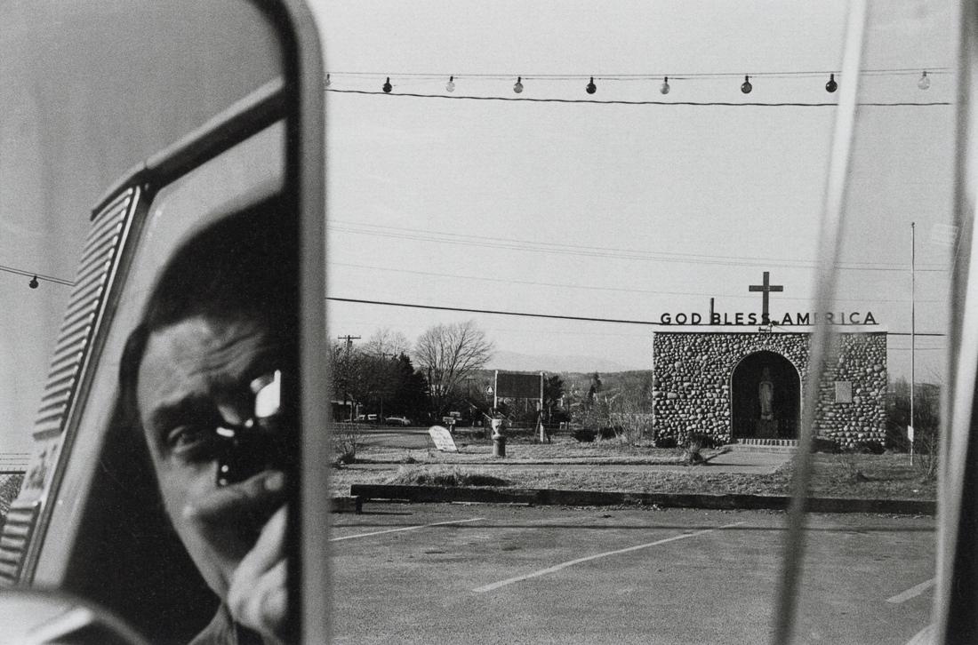 LEE FRIEDLANDER - Route 9W, New York, 1969: Artist: Lee Friedlander Title: Route 9W, New York, 1969 Medium: Photo Litho, 2000, Germany Dimensions: 7x4.6" Description: Heat Wax Mounted on 8.5x11" Conservation Board Artist Bio: Lee Friedlander (