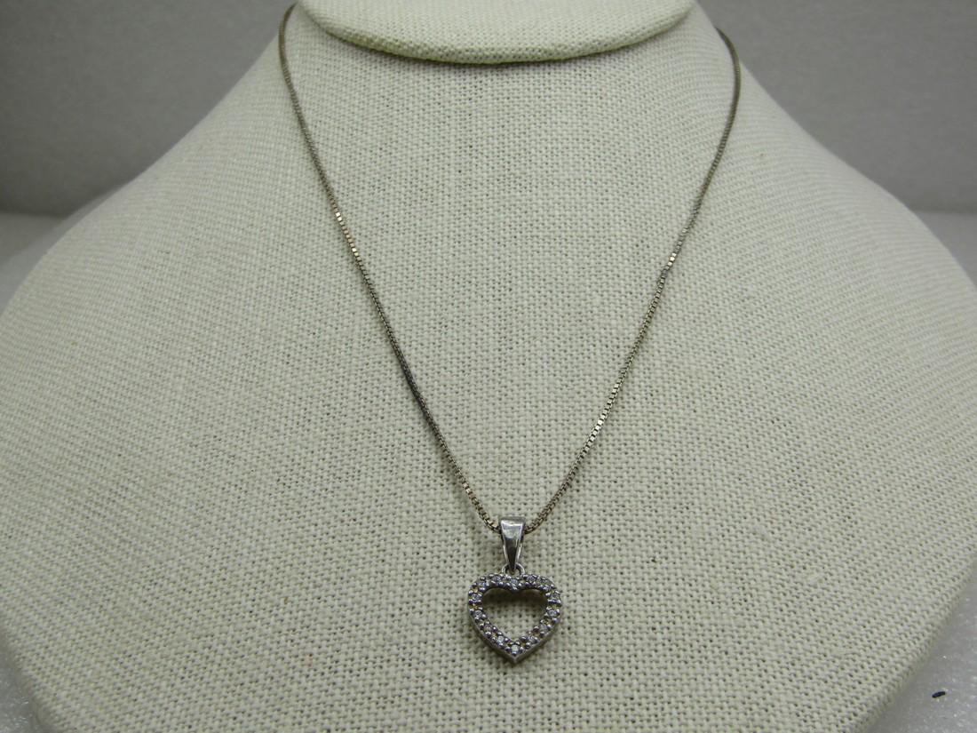 Vintage Sterling CZ Heart Necklace, 16", Signed: Vintage Sterling CZ Heart Necklace, 16", Signed QC on Pendant and OGI Italy on Chain. Both marked .925 and tested. Weight of pendant and 1mm box chain is appx. 3.67 gr. Seing bail on the pendand which