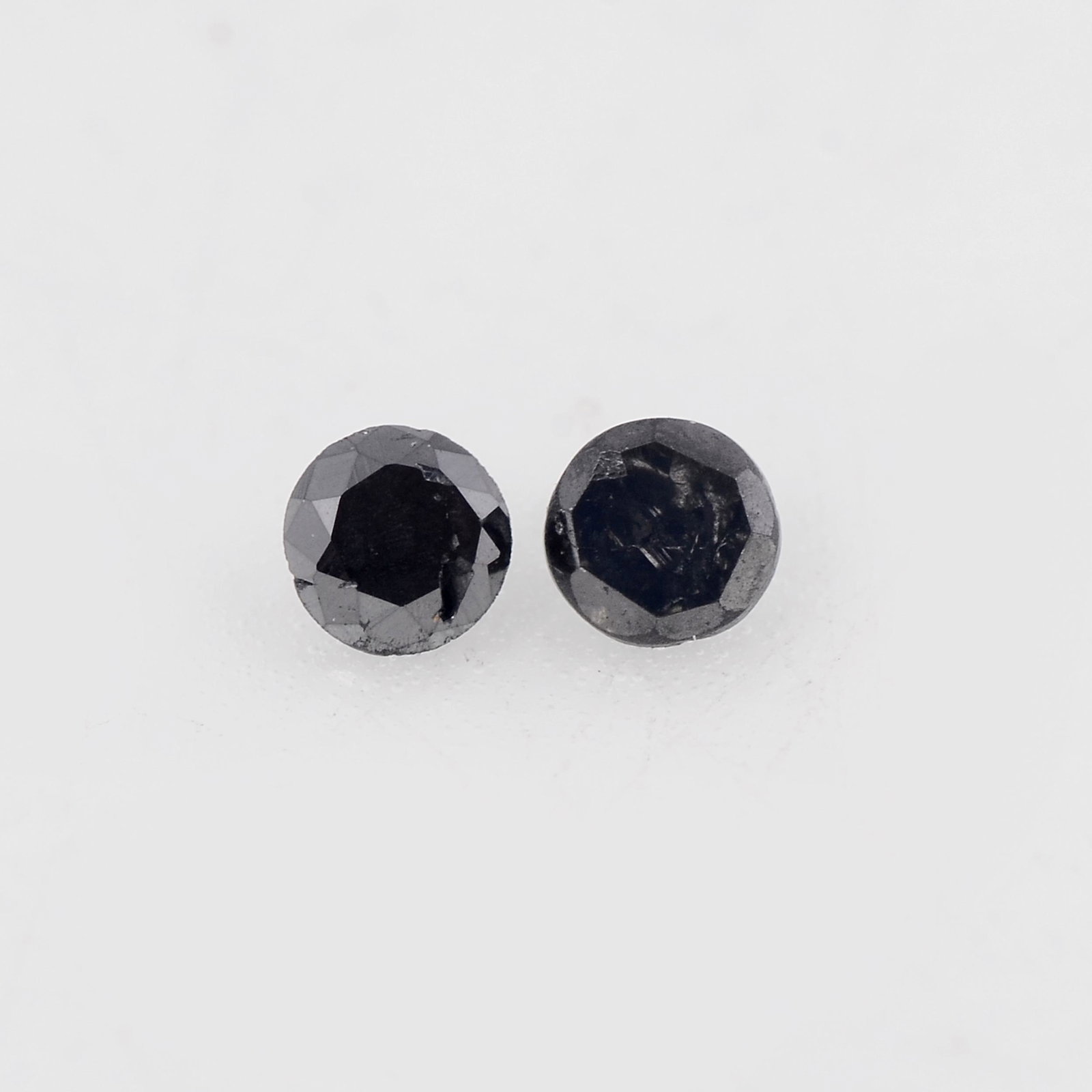0.026 Carat Fancy Black Color Round Natural Diamond Loose Gemstone 2 Pieces: No Reserve! Title: 0.026 Carat Fancy Black Color Round Natural Diamond Loose Gemstone 2 Pieces Additional Information: Specification of Gemstone Stone : Diamond Shape : Round Size : 1.5L x 1.5W mm Col