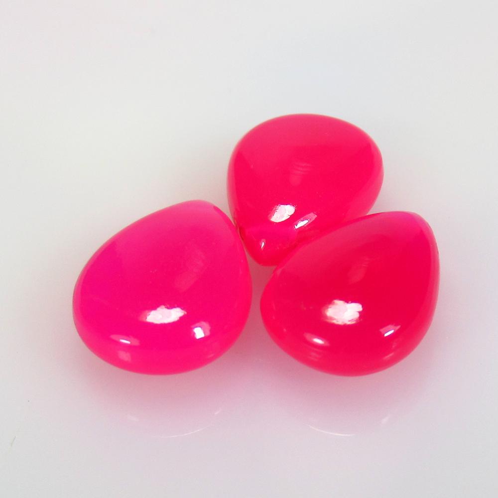 11.70 Ctw Natural 3 Drilled Pink Onyx Beads: No Reserve! Title: 11.70 Ctw Natural 3 Drilled Pink Onyx Beads Stone Clarity: Opaque Gemstones: Onyx Beads Carat Weights: 11.7 Size/Dimensions: 12.1x9.6 - 12.5x9.4 mm / 3 Pc's Additional Information: 