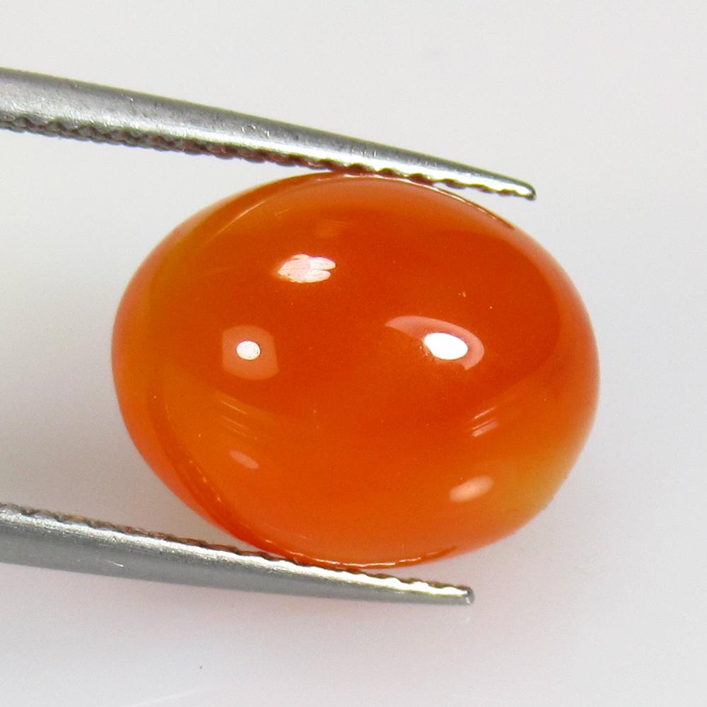 6.71 Ctw Natural Orange Carnelian Oval Cab: No Reserve! Title: 6.71 Ctw Natural Orange Carnelian Oval Cab Stone Clarity: Semi-Transparent Gemstones: Natural Carnelian Carat Weights: 6.71 Size/Dimensions: 13.40 x 10.60 x 6.50 mm Additional Infor