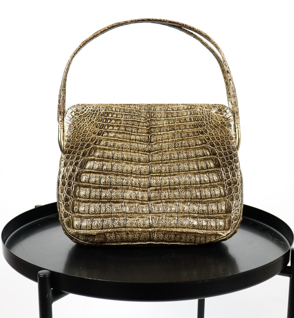 REAL CROCODILE SKIN LEATHER HANDBAG: Title: REAL CROCODILE SKIN LEATHER HANDBAG Size/Dimension: Bag measurements without handle/strap: Height: 21cm,8.26 in; Width:28cm,11.02 in; Additional Information: We offer in house shipping - Fedex 