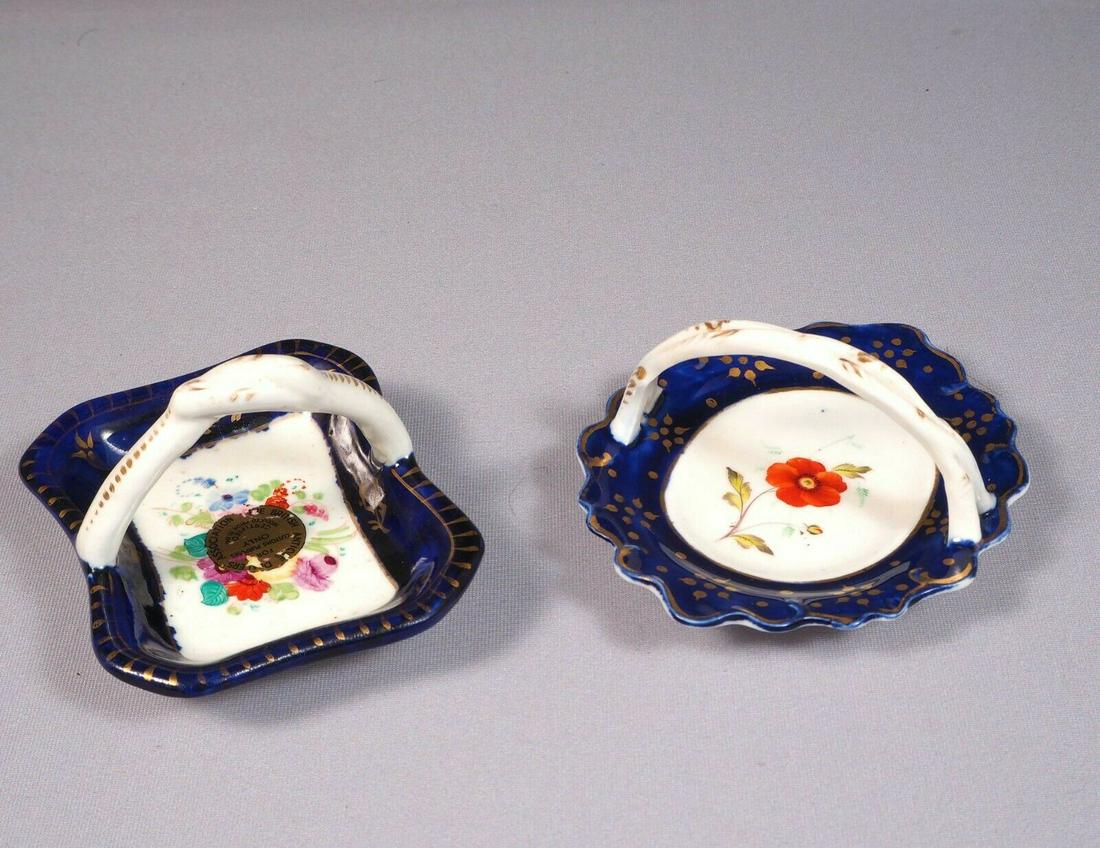 2 Antique Porcelain Cobalt Basket Tray Candy Nut Dish Set Handles Certified 1841: This is an exceptional Set of 2 (two) small Baskets/Nut Dishes/Trays. They are in cobalt blue and gold. One of them bears and British antique Dealers Association certifying that is made prior to 1841.