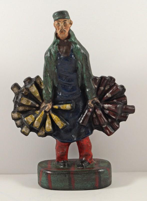 Antique Wineman Wine Merchant Cast Iron Doorstop: Title: Antique Wineman Wine Merchant Cast Iron Doorstop Circa 1920’s. Dimension: 9 3/4" tall x 7" wide. Additional Information: A full-figure, solid casting Doorstop, depicting a Wineman (Nectar